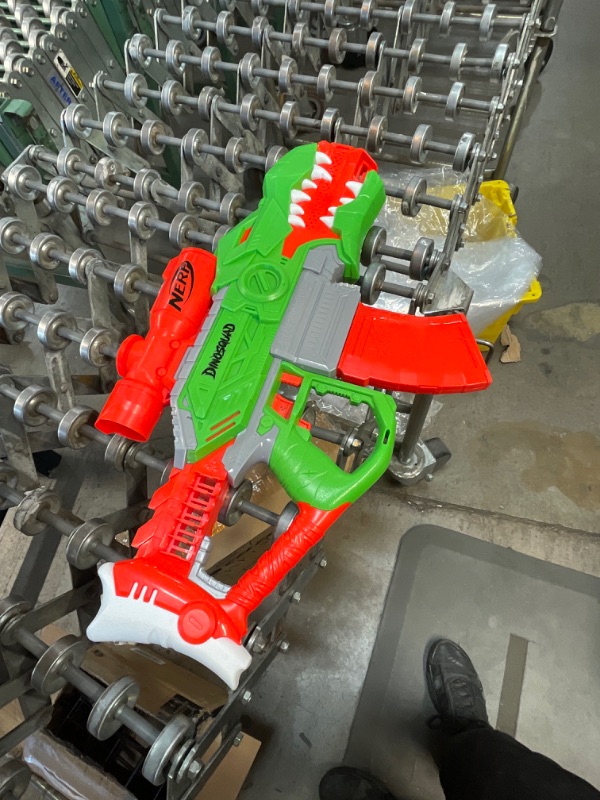 Photo 2 of NERF DinoSquad Rex-Rampage Motorized Dart Blaster, 10 DART CLIP Storage- T-Rex Dinosaur Design , Red