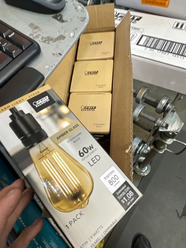 Photo 2 of 60-Watt Equivalent ST19 Dimmable Straight Filament Amber Glass Vintage Edison LED Light Bulb, Warm White (PACK OF 4)