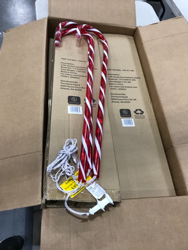 Photo 1 of 27 in. Lighted Candy Cane Pathway Incandescent Light (3-Set)
4 boxes.