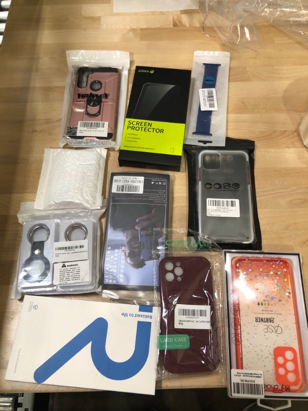 Photo 1 of **SOLD AS IS -NO REFUNDS **** BUNDLE OF ASSORTED PHONE CASES & ACCESSORIES ( DIFFERENT MODELS )