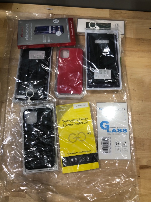 Photo 1 of **SOLD AS IS -NO REFUNDS **** BUNDLE OF ASSORTED PHONE CASES &  ACCESSORIES ( DIFFERENT MODELS )
