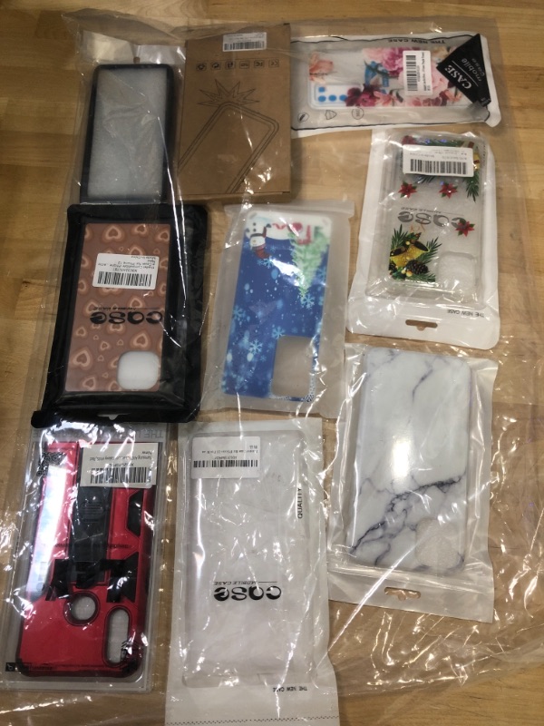 Photo 1 of **SOLD AS IS -NO REFUNDS **** BUNDLE OF ASSORTED PHONE CASES & ACCESSORIES ( DIFFERENT MODELS )