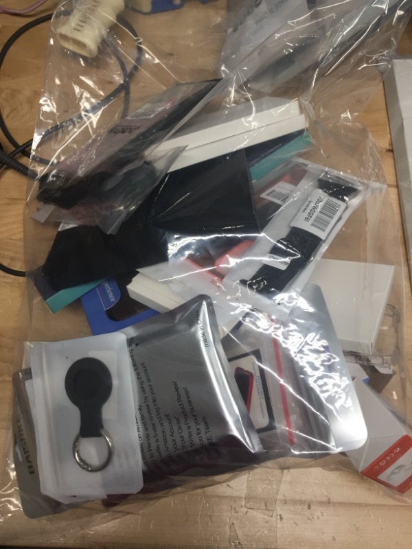 Photo 1 of ASSORTED BAG OF PHONE CASES AND ACCESSORIES 
**SOLD AS IS, NO RETURNS/REFUNDS, NO STOCK PHOTOS**