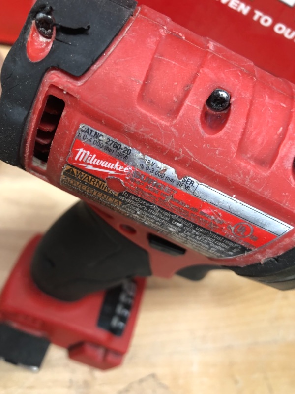Photo 2 of **HEAVY USE**
Milwaukee
M18 FUEL 18-Volt Lithium-Ion Brushless Cordless 1/4 in. Hex Impact Driver (Tool-Only)