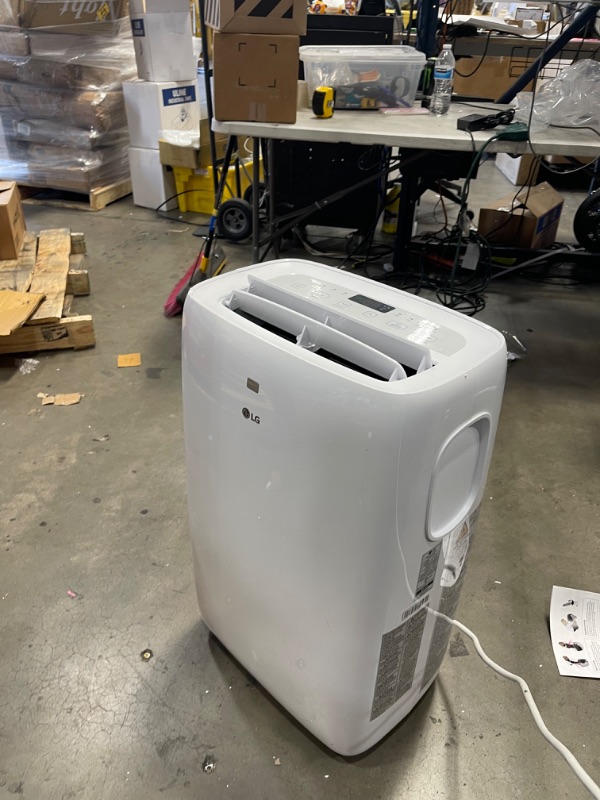 Photo 2 of ***TURNS ON, MAKES A LOUD NOISE*** LG 6,000 BTU Portable Air Conditioner
