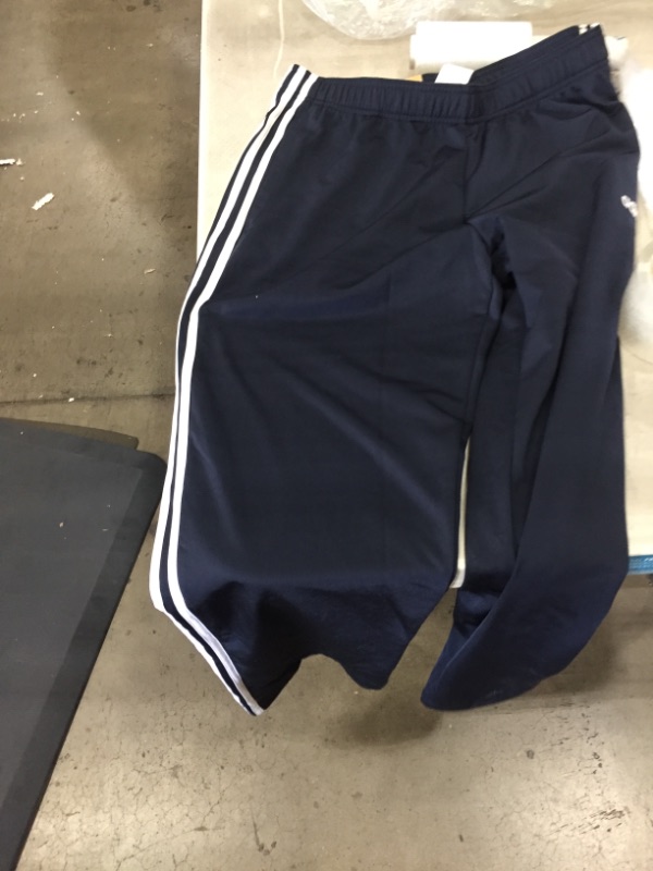 Photo 2 of Adidas Essentials 3-Stripes Tricot Open Hem Pants size large 
(smell like they were wet )