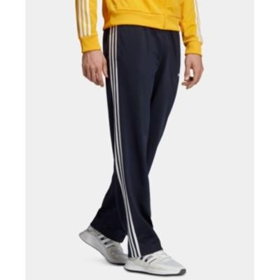 Photo 1 of Adidas Essentials 3-Stripes Tricot Open Hem Pants size large 
(smell like they were wet )