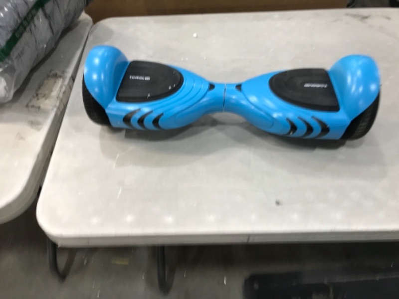 Photo 3 of SELF BALANCE SEEMS OFF 
Kids Hoverboard | Black Hoverboard for Kids| TOMOLOO Bluetooth Hoverboard / Q2C Blue