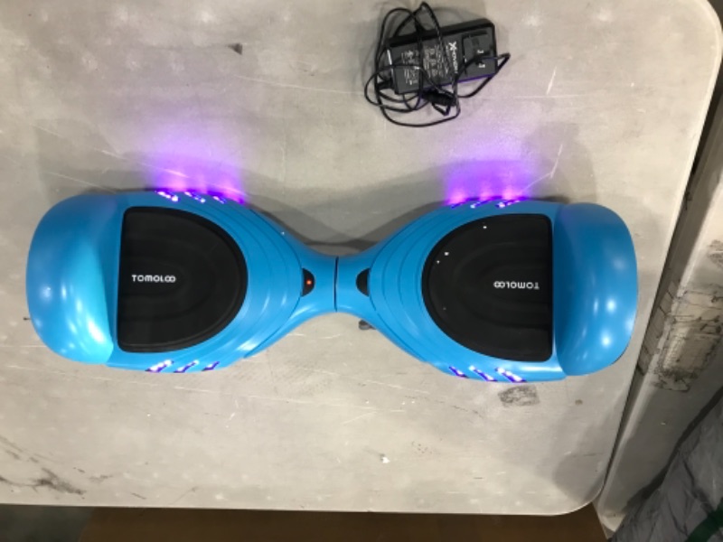 Photo 2 of SELF BALANCE SEEMS OFF 
Kids Hoverboard | Black Hoverboard for Kids| TOMOLOO Bluetooth Hoverboard / Q2C Blue