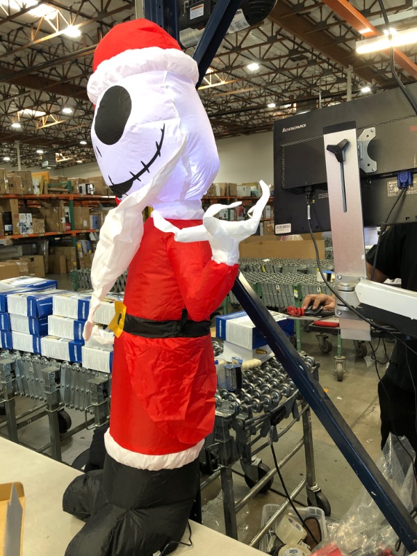 Photo 2 of **SLIGHTLY DIFFERENT FROM STOCK PHOTO**
Gemmy Christmas Inflatable Jack Skellington Holding Christmas Lights Indoor/Outdoor Decoration
