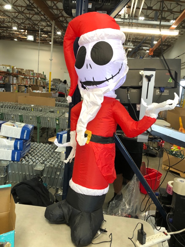 Photo 3 of **SLIGHTLY DIFFERENT FROM STOCK PHOTO**
Gemmy Christmas Inflatable Jack Skellington Holding Christmas Lights Indoor/Outdoor Decoration
