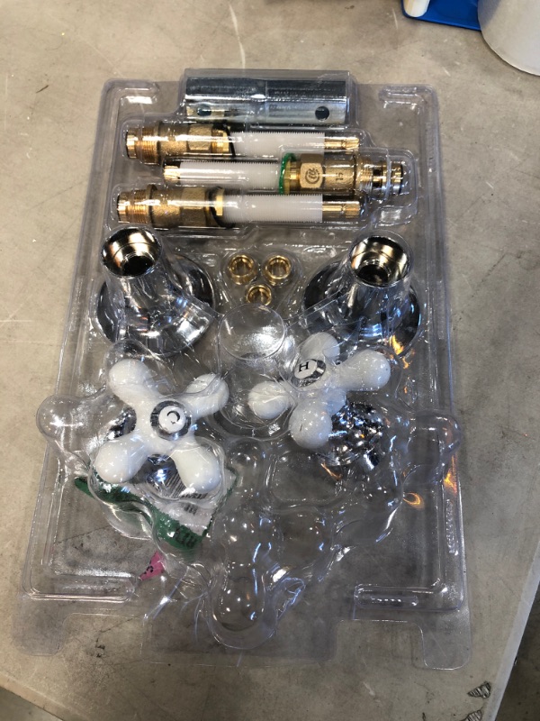 Photo 1 of **INCOMPLETE**
Porcelain Cross-Handle Bathtub and Shower Faucet Rebuild Kit
