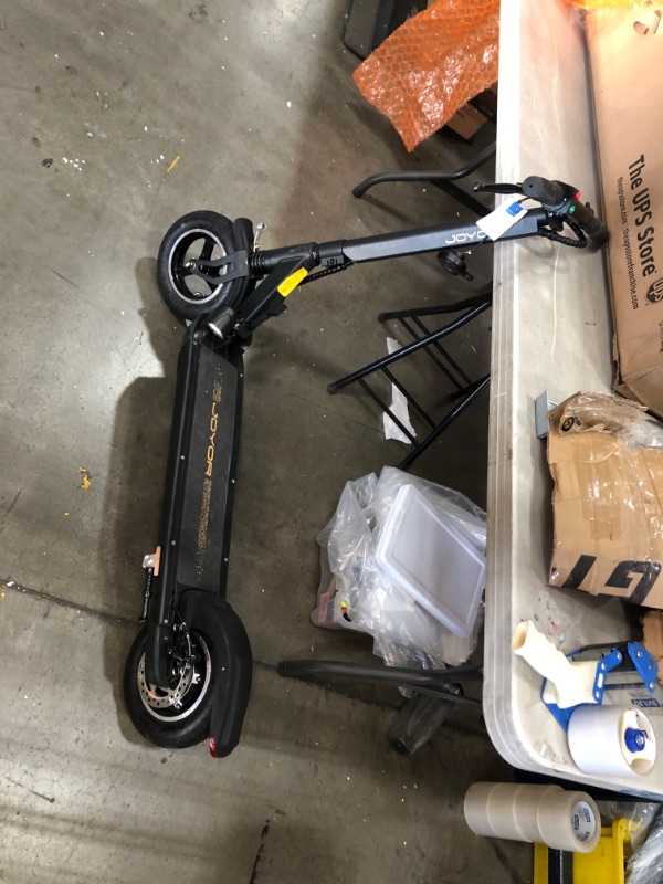 Photo 3 of (MISSING CHARGING CORD; SCRATCH DAMAGES; BROKEN FRONT LIGHT ATTACHMENT; UNABLE TO TEST DUE TO ZERO POWER)
joyor electric scooter x5s
