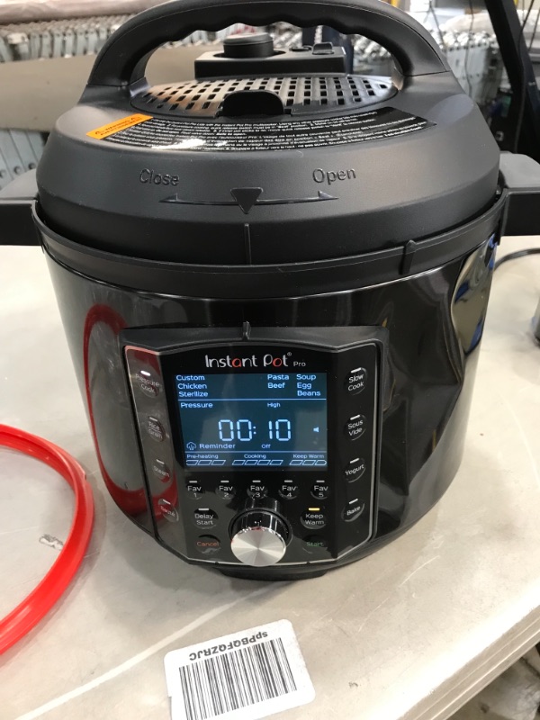 Photo 3 of (DENTED FRONT) Instant Pot Pro 10-in-1 Pressure Cooker, Slow Cooker, Rice/Grain Cooker, Steamer, Sauté, Sous Vide, Yogurt Maker, Sterilizer, and Warmer, 6 Quart
