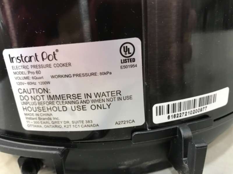 Photo 4 of (DENTED FRONT) Instant Pot Pro 10-in-1 Pressure Cooker, Slow Cooker, Rice/Grain Cooker, Steamer, Sauté, Sous Vide, Yogurt Maker, Sterilizer, and Warmer, 6 Quart
