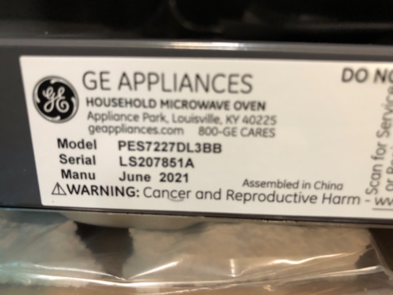 Photo 4 of TESTED TURNS ON*
GE Profile 2.2 cu. ft. Countertop Microwave in Black with Sensor Cooking