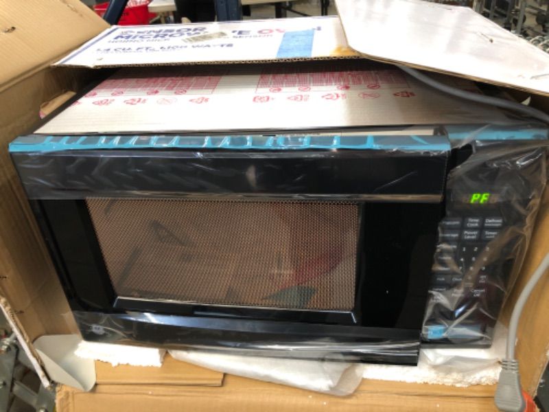 Photo 2 of TESTED TURNS ON**
1.4 cu. ft. Countertop Microwave in Black