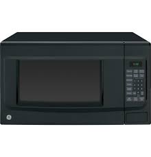 Photo 1 of TESTED TURNS ON**
1.4 cu. ft. Countertop Microwave in Black