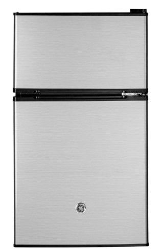 Photo 1 of *SEE last picture for damage*
GE 3.1 cu. ft. Double-Door Mini Fridge in Clean Steel
