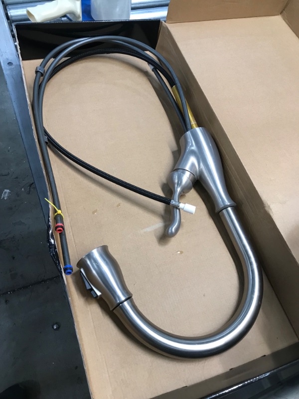Photo 1 of *USED*
*MISSING manual* 
Delta Faucet Leland Brushed Nickel Kitchen Faucet with Pull Down Sprayer, Spot Shield Stainless 9178-SP-DST