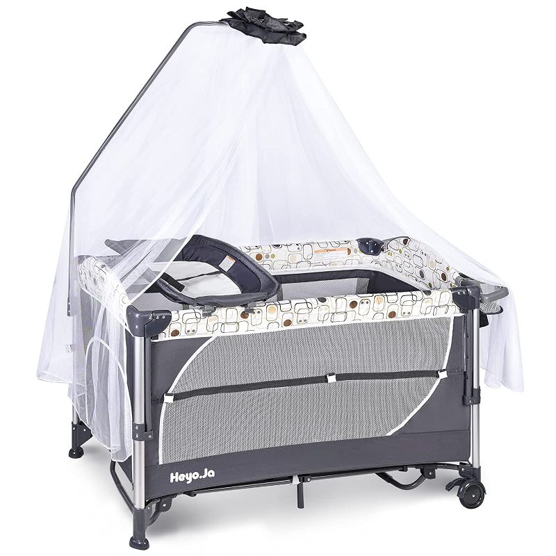 Photo 1 of Heyo.Ja Double Layer Baby Portable Playard, 5 Height Adjustable Crib,Changing Table, Foldable Bassinet Bed with Luxury Mosquito Net,Toys Bag,Wheels & Brake, Game Entrance for Boys Girls(Grey)
