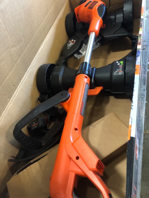 Photo 1 of Black & Decker MTC220 Max Cordless Lithium-Ion 3-in-1 Trimmer/Edger & Mower, Orange/ Black