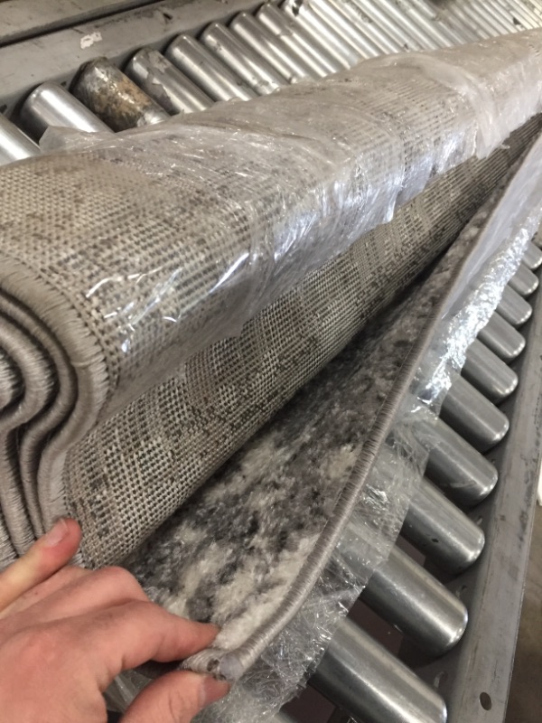 Photo 1 of 6 FT 7 IN BY 9 FT SMOKY INDOOR RUG
