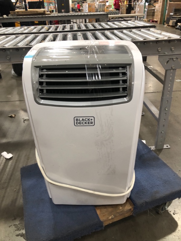 Photo 1 of BLACK+DECKER 8,000 BTU DOE (14,000 BTU ASHRAE) Portable Air Conditioner with Remote Control, White
model: BPACT14WT
serial number: 86576Z2106230253003