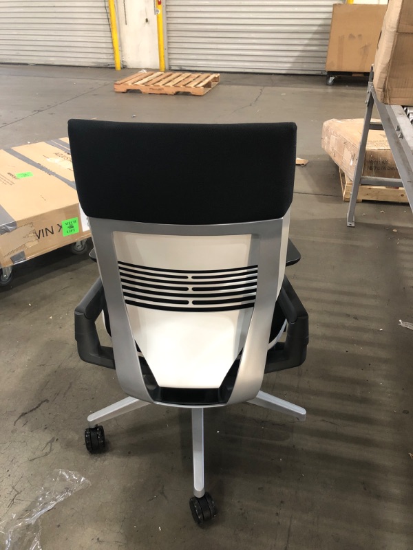 Photo 2 of missing one wheel*
Steelcase Gesture Office Chair - Buzz2 Black Upholstered Wrapped Back Platinum Metallic Frame Medium Seat Light Seagull Seat/Back Dark Merle Arms (Light/Light) Hard Floor Caster Wheels
