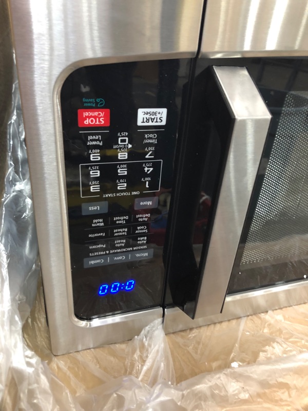 Photo 3 of TESTED TURNS ON*
Toshiba EC042A5C-SS Countertop Microwave Oven with Convection, Smart Sensor, Sound On/Off Function and LCD Display, 1.5 Cu.ft, Stainless Steel
