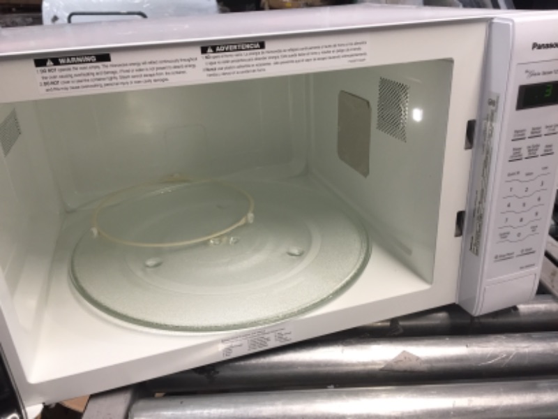 Photo 4 of **LIGHT DAMAGE TO BACK**
Panasonic Genius Sensor 2.2 Cu. Ft. 1250W Countertop Microwave Oven with Inverter Technology