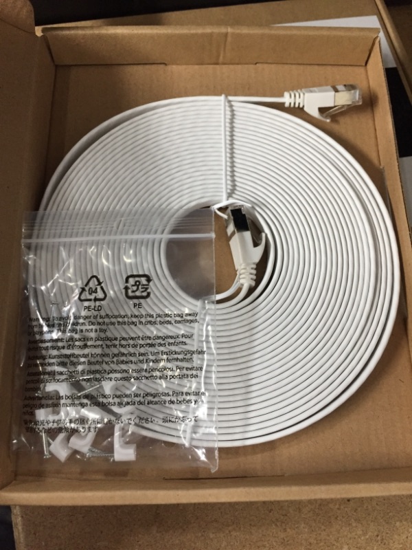 Photo 2 of 2 PACKS OF Amazon Basics Cat 7 Gigabit Ethernet Patch Internet Cable, Flat - 25FT, 1Pack, White - Include 10 Nails
