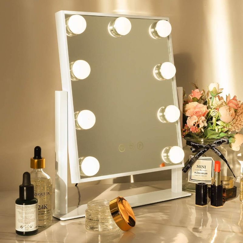 Photo 1 of Hansong Vanity Mirror with Lights Light up Vanity Makeup Mirror with 9 LED Bulbs Tabletop Plug in Makeup Mirror with Lights 360 Rotation with 10x Magnifying Mirror
