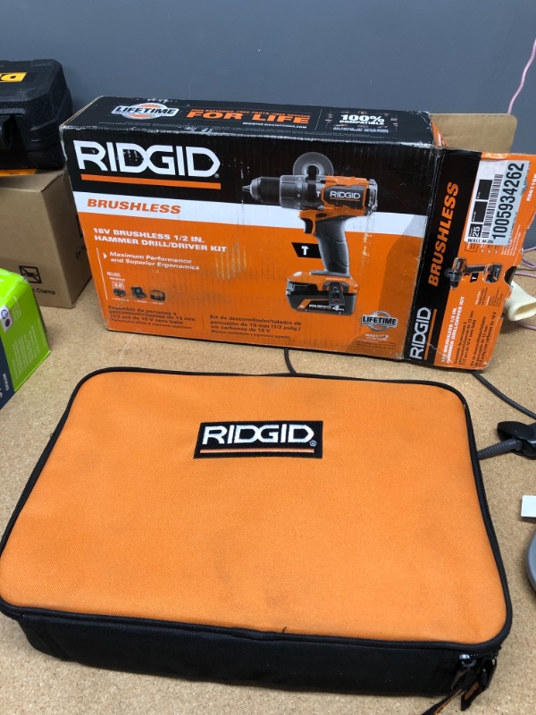 Photo 5 of USED RIDGID 18V Brushless Cordless 1/2 in. Hammer Drill/Driver Kit with 4.0 Ah MAX Output Battery, 18V Charger, and Tool Bag
