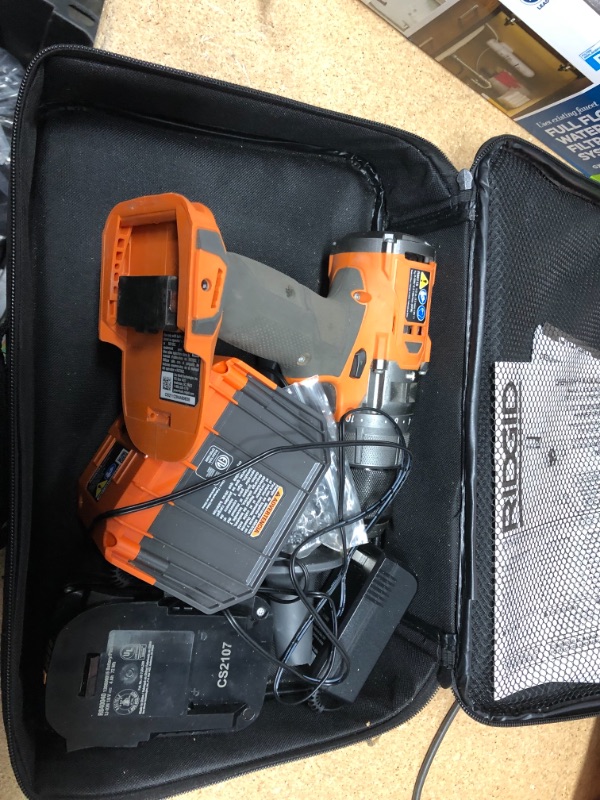 Photo 1 of USED RIDGID 18V Brushless Cordless 1/2 in. Hammer Drill/Driver Kit with 4.0 Ah MAX Output Battery, 18V Charger, and Tool Bag
