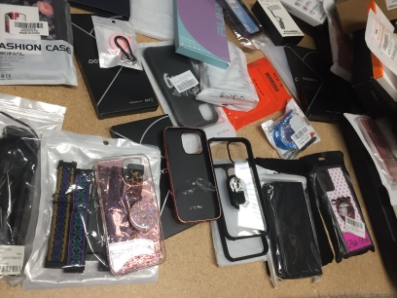 Photo 1 of **Final Sale**
Assortment of Cell Phone Accessories 