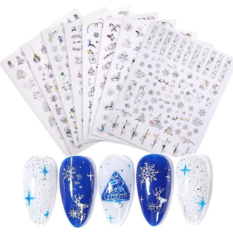 Photo 1 of 12 packs of Christmas Nail Art Stickers Decals Self-Adhesive Nail Sticker 9 Sheets Laser Silver Xmas Tree Snowflake Sticker for Manicure DIY Nail Art Decorations Supplies