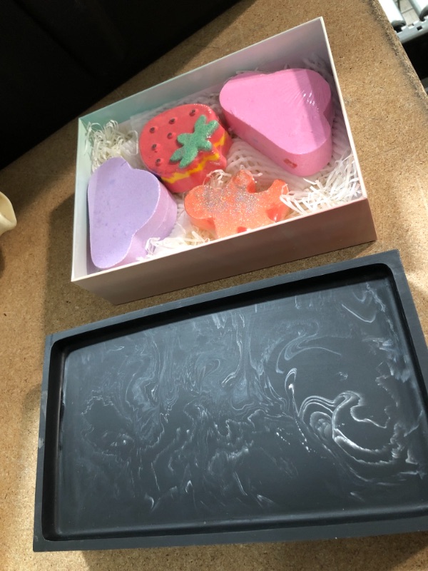 Photo 1 of **NO REFUNDS/RETURNS** - Bath bombs and a tray 