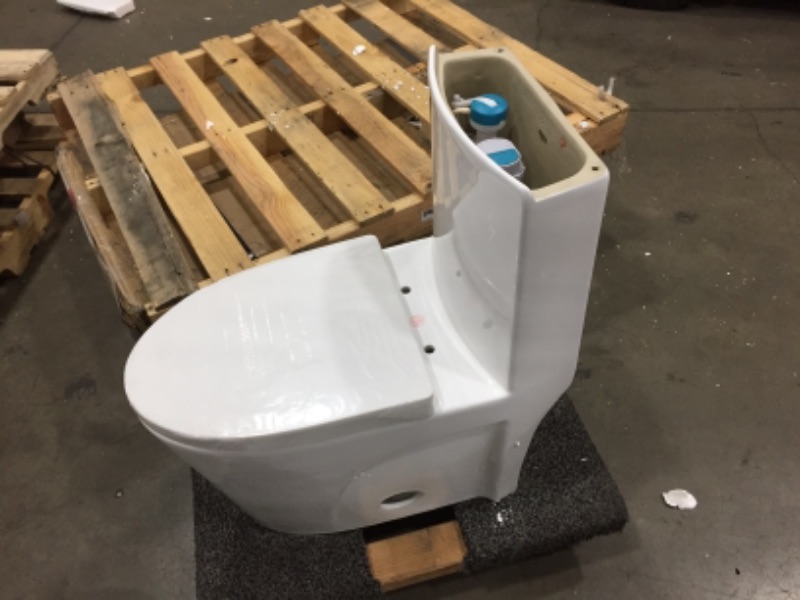 Photo 2 of missing lid**
Swiss Madison St. Tropez 1-Piece 0.8/1.28 GPF Dual Flush Elongated Toilet in White
