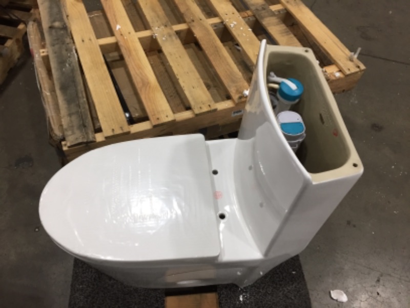 Photo 3 of missing lid**
Swiss Madison St. Tropez 1-Piece 0.8/1.28 GPF Dual Flush Elongated Toilet in White
