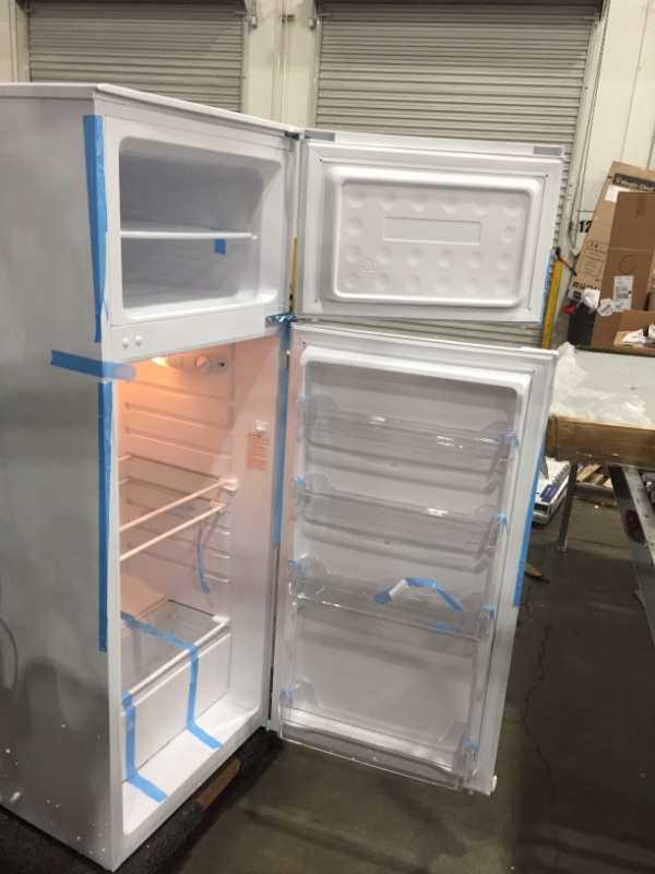 Photo 4 of **MINOR DENTS**
Magic Chef 7.4 Cu. Ft. 2-Door Mini Fridge in White