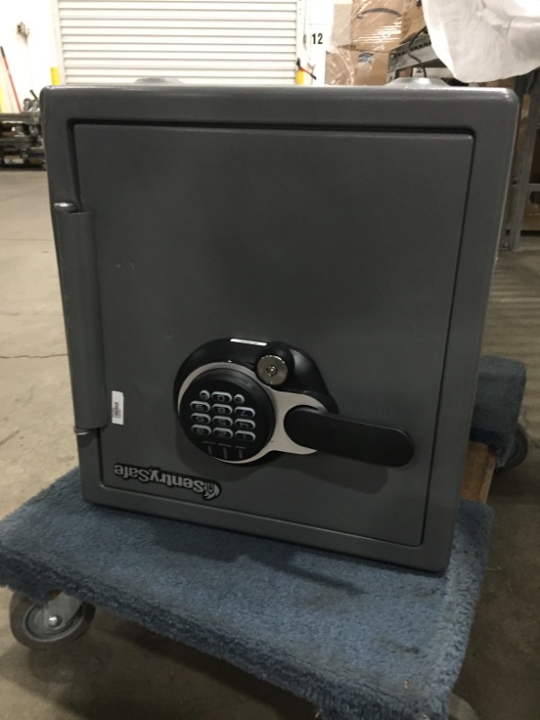 Photo 2 of **PARTS ONLY, MISSING KEYS , UNABLE TO OPEN**
SentrySafe SF123ES Fireproof Safe with Digital Keypad 1.23 Cubic Feet, Black
