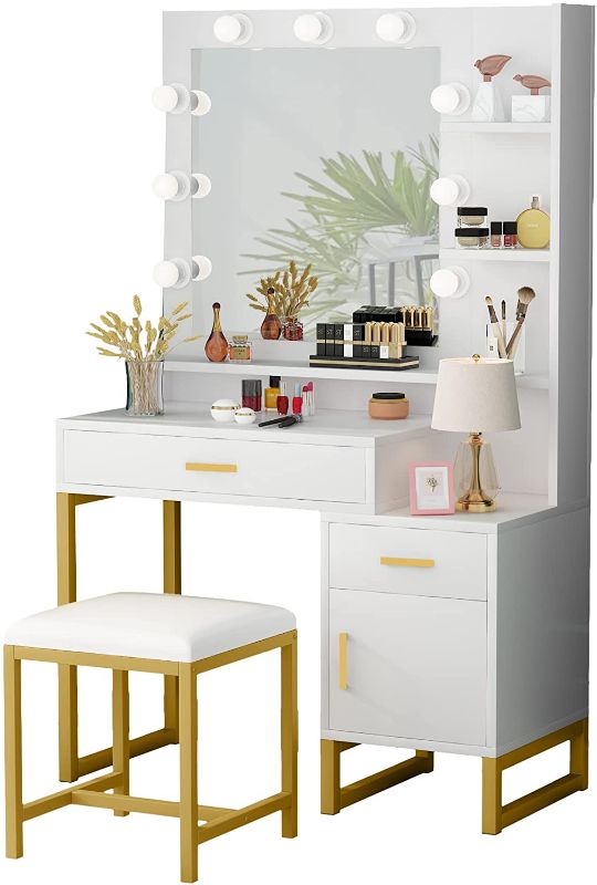 Photo 1 of **MISSING HARDWARE.,MISSING COMPONENTS**
Tribesigns Vanity Set with Lighted Mirror & Stool, Elegant Makeup Table Vanity Dresser with 9 LED Light, Drawer, Storage Shelves and Cabinet for Women Girls, Dressing Table for Bedroom, White and Gold

