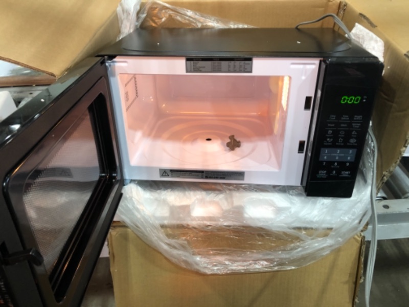Photo 1 of COMFEE' EM720CPL-PMB Countertop Microwave Oven with Sound On/Off, ECO Mode and Easy One-Touch Buttons, 0.7cu.ft, 700W, Black 17.3 x 13 x 10.2 inches

