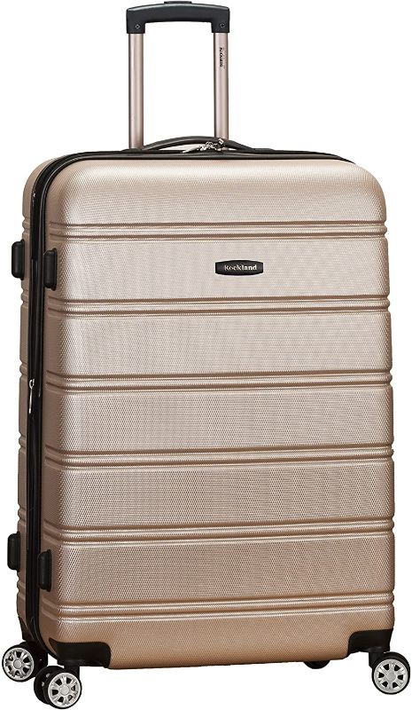 Photo 1 of *SEE last picture for damage*
Rockland Melbourne Hardside Expandable Spinner Wheel Luggage, Champagne, Checked-Large 28-Inch
