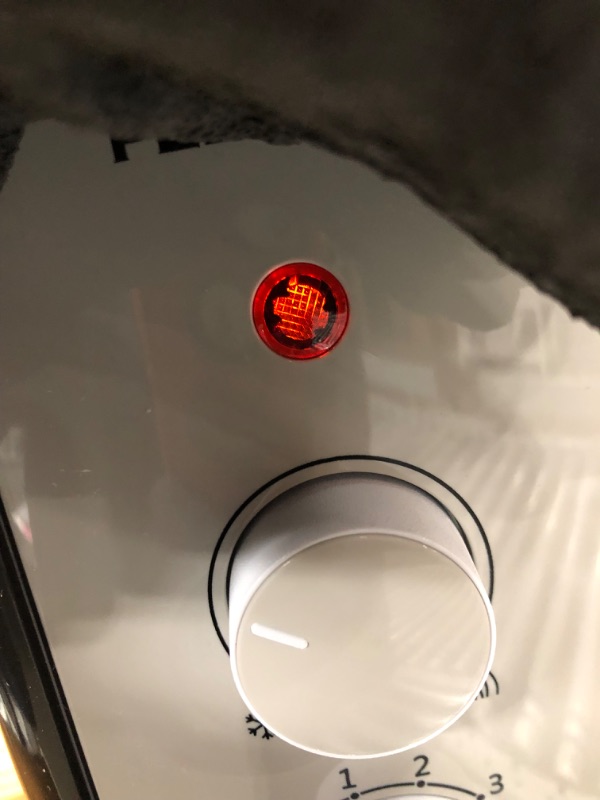 Photo 1 of *USED*
Pelonis 1,500-Watt Oil-Filled Radiant Electric Space Heater with Thermostat