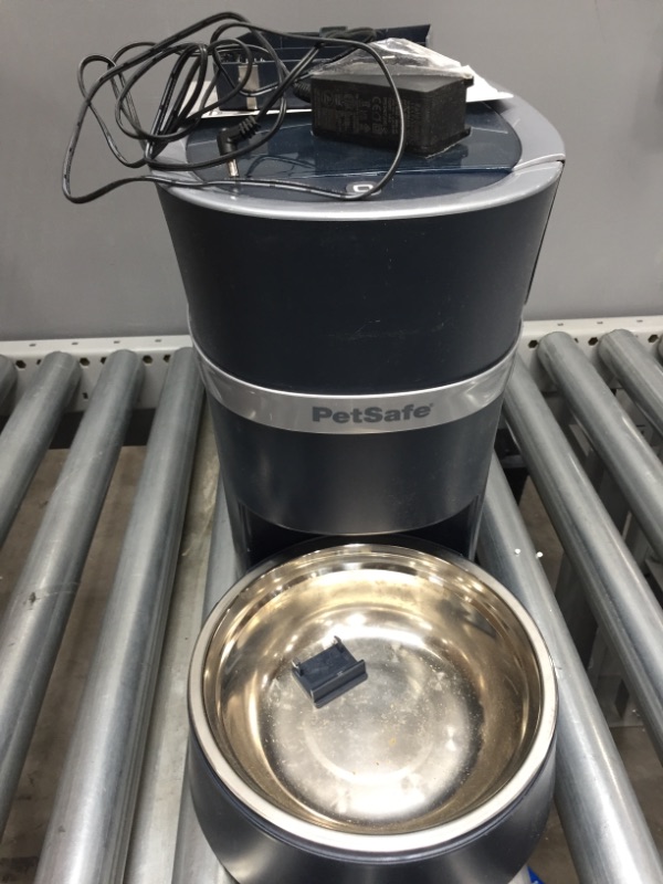 Photo 2 of **PREVIOUSLY USED, STILL HAS FOOD CRUMBS INSIDE, COULD NOT TEST FUNCTIONALITY** 
PetSafe Smart Feed Automatic Dog and Cat Feeder - Smartphone - Wi-Fi Enabled for iPhone and Android Smartphones
