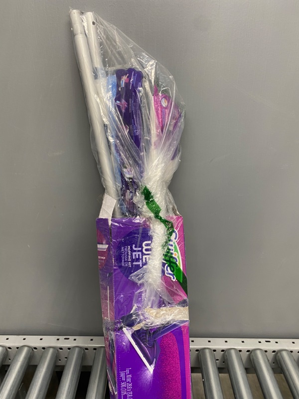 Photo 1 of **PREVIOUSLY HANDLED BY LAST OWNER, LIGHT SCUFFING ON HEAD OF MOP**
Swiffer WetJet Hardwood and Floor Spray Mop Cleaner Starter Kit, Includes: 1 Power Mop, 10 Pads, Cleaning Solution, Batteries
