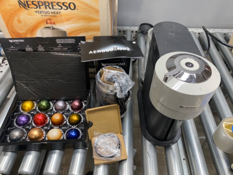 Photo 2 of **PREVIOUSLY OPENED, NO USAGE**
Nespresso by Breville Vertuo Next Classic Black Coffee and Espresso Machine Bundle
