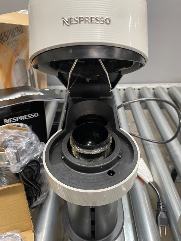 Photo 3 of **PREVIOUSLY OPENED, NO USAGE**
Nespresso by Breville Vertuo Next Classic Black Coffee and Espresso Machine Bundle
